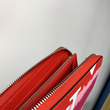 Load image into Gallery viewer, LOUIS VUITTON M69110 ESCALE ZIPPY
