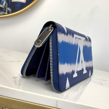 Load image into Gallery viewer, LOUIS VUITTON M69110 ESCALE ZIPPY
